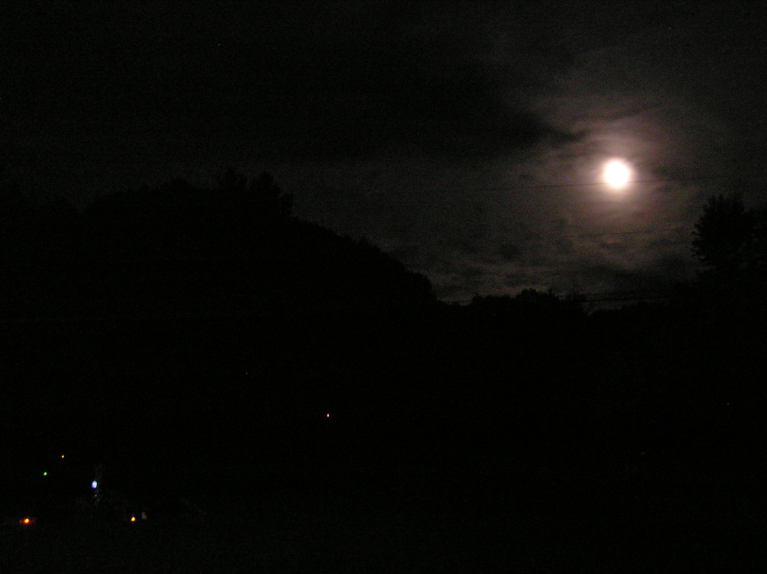 SolarLitesAndFullMoon2014.JPG